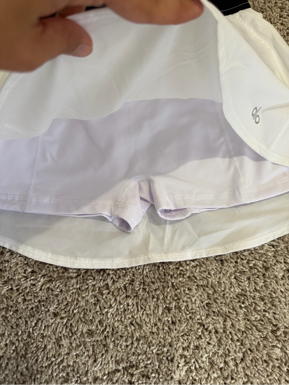 ALO Yoga White Mini Skirt with Black Elastic Waistband - Picture 2 of 4